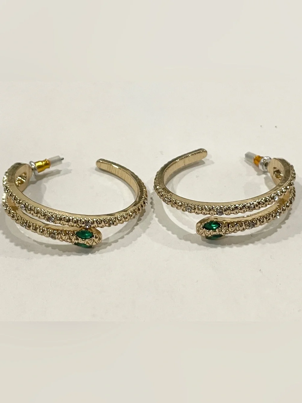 Gold Sparkle Snake Hoop Earrings with Green Eye Stone Accents